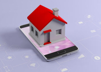A small model house with a red roof sits on top of a smartphone, symbolizing smart home technology and a real estate investment app, on a light purple background with digital icons representing connectivity and automation. | FintechZoom