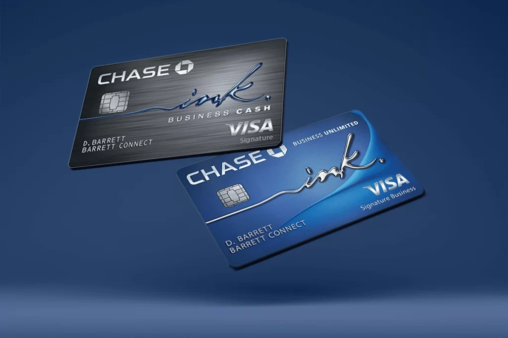 Two Business Credit Cards from Chase Ink, one silver labeled "Cash" and one blue labeled "Unlimited," float against a blue background. Both cards feature Visa Signature logos and the name "D. Barrett. | FintechZoom