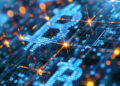 Digital illustration of glowing blue Bitcoin symbols and circuitry, with orange lights and abstract data lines, representing cryptocurrency and blockchain technology. | FintechZoom