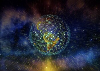 A digital globe with network lines and nodes overlaid, showing the Americas, surrounded by a cosmic, star-filled background representing global connectivity and technology. | FintechZoom