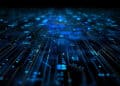 A digital abstract image showing glowing blue circuit lines and patterns on a dark background, resembling a futuristic electronic circuit board or data network. | FintechZoom